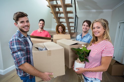 Shoreditch office relocation team preparing desks and boxes for transport
