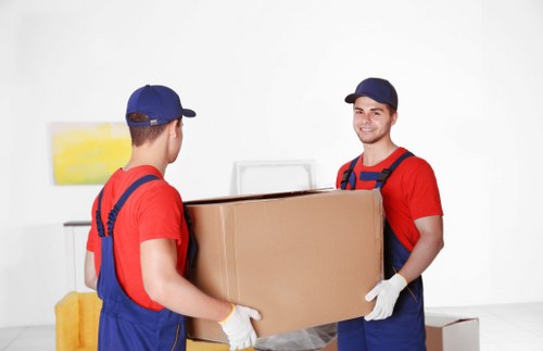 Furniture removal team handling a sofa move in Shoreditch