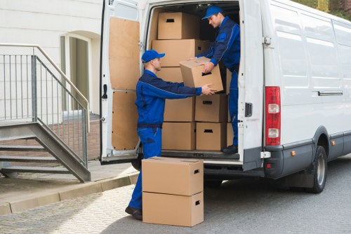 Worker using careful handling practices during a move