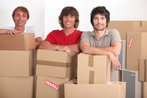 Loading boxes and household items into a van in Shoreditch