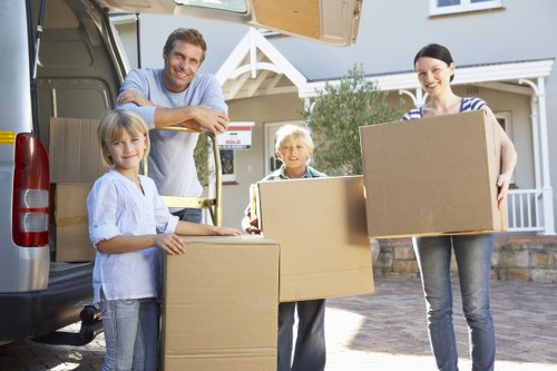 Packing essentials including tape, bubble wrap, and cartons for fragile items