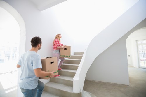 Local movers handling furniture and boxes for a Shoreditch property