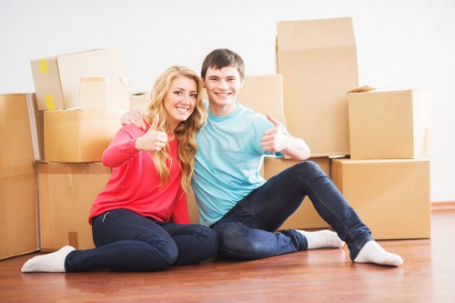 Shoreditch home removals team handling furniture and boxes carefully