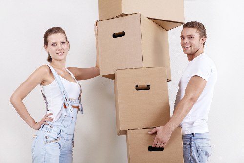 Packed boxes and furniture prepared for a flat move in Shoreditch