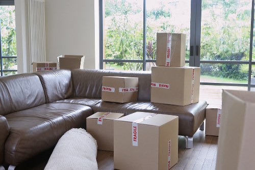 Local removal company loading items for a Shoreditch move with careful packing and transport